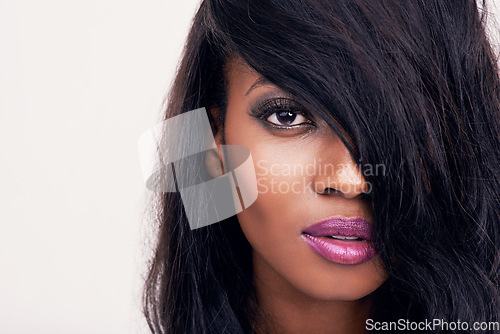 Image of Portrait, beauty and face of black woman in studio for makeup, hair extension or cosmetics. Headshot of african female model on a white background for facial shine, skin glow or skincare mockup