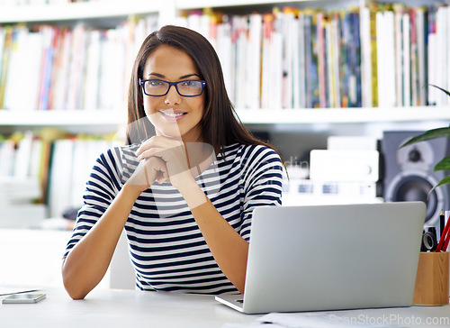 Image of Woman, student portrait and laptop at home with a smile from learning at a study desk. Young female person, computer and online work and technology in house with pc on a website working in library