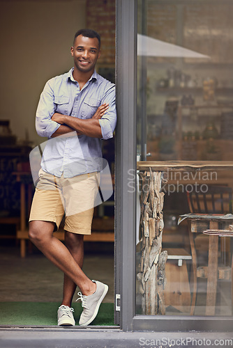 Image of Coffee shop, black man and portrait of small business owner at door of retail startup. Entrepreneur, male person and manager of professional store with a smile for service, career pride and goals