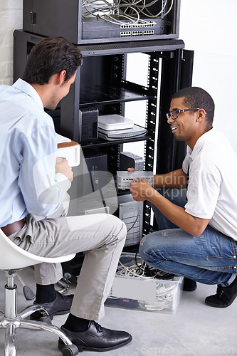 Image of Server room, it support and maintenance with an engineer talking to a business man about cyber security. Network, database and consulting with a technician chatting about information technology