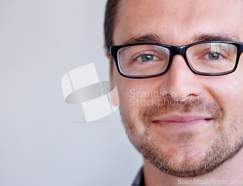 Image of Portrait, mockup and man with glasses, optometry and guy against a white studio background. Face, male person and model with eyewear, clear vision and optometry with sight, looking and see with eyes