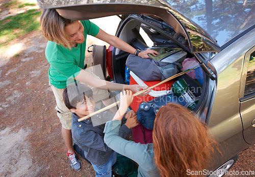 Image of Happy family, car and packing for camping road trip, holiday or vacation above in nature outdoors. Top view of dad and kids getting ready for travel, camp adventure or getaway together in the forest