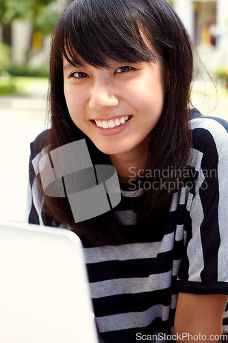 Image of Portrait, education and Asian woman on campus, laptop and social media with connection, project and email. Face, female person and student with a pc, knowledge and typing with website information