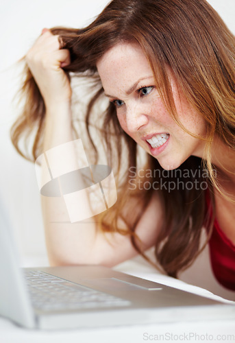 Image of Stress, angry and a woman with a laptop for an email, technology glitch or connectivity fail. Anger, reading information and a girl frustrated about an online problem, computer mistake or overworked