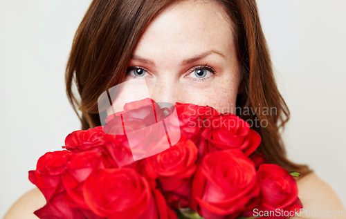 Image of Roses, flower bouquet and portrait of woman with red gift for love, celebrate and a valentines day floral present or glamour. Aesthetic, skincare and eyes of female person or model with plants