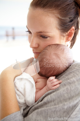 Image of Family, hug and mother with a baby, love and sleeping with care, bonding and loving together. Mama, infant and toddler embrace, rest and relax with child development, newborn and support with safety