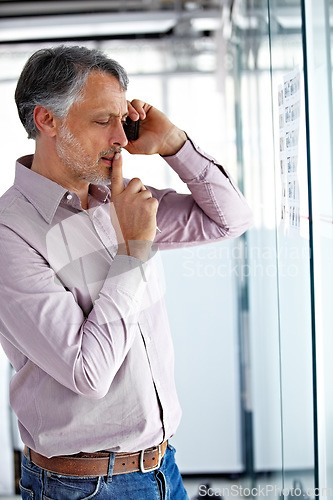 Image of Senior business man, thinking during phone call and ideas on glass board, agenda and brainstorming for ad campaign. Communication, problem solving and concentration, male worker and advertising plan