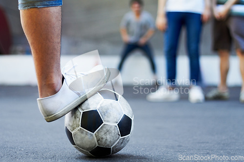 Image of Soccer ball, closeup and foot with exercise, fitness and competition with training, workout and health. Zoom, feet and team with match, football and sports with shoes, growth and athlete in a game