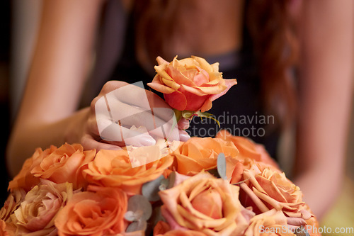 Image of Closeup, hands and woman with flowers, entrepreneur and prepare order for a customer, nature and bouquet. Zoom, female person or business owner with plants, floral arrangement or florist with startup