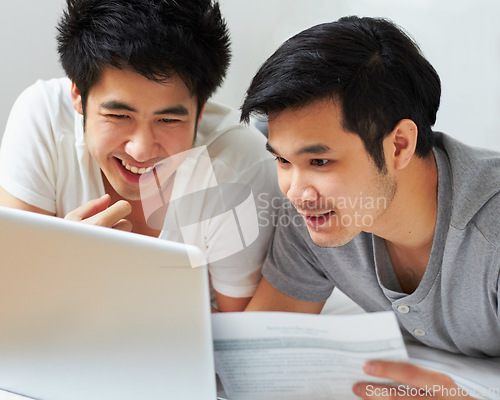 Image of Smile, email and a gay couple with a laptop for bills, insurance or mortgage payment at home. Happy, bedroom and Asian men reading information to pay a loan with online banking on a computer