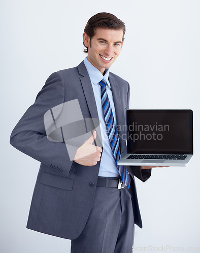 Image of Corporate man, laptop screen and thumbs up in portrait, like opinion and mockup space by white background. Businessman, funny entrepreneur and computer with good news, vote and promo for brand review