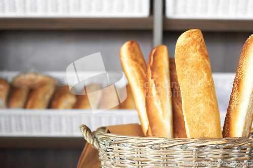 Image of Bakery, bread basket and a supermarket or grocery store for a diet or healthy food with nutrition on a shelf. Morning, kitchen and oven baked fresh roll or product for lunch or breakfast in a shop