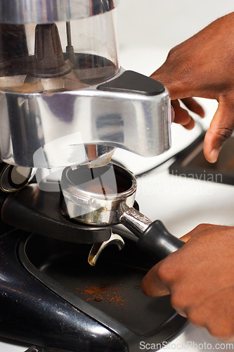 Image of Barista hands, cafe and espresso with coffee machine for service with brewing process in closeup. Restaurant, hot beverage and hand with person working for preparation with premium caffeine blend.