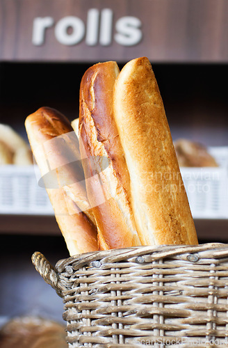 Image of Bakery, bread basket and grocery store, supermarket or coffee shop for a diet or healthy food with nutrition. Morning, kitchen and oven baked fresh roll or product for lunch or breakfast in a shop