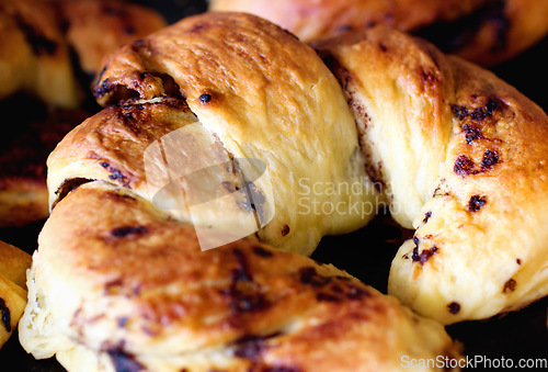 Image of Chocolate croissant, food and bakery cooking for catering service, breakfast or baked meal at cafe. Closeup of fresh or crispy bread or dessert for eating, sweet cake or nutrition roll in the kitchen