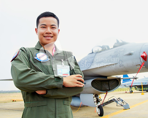 Image of Portrait of asian man, fighter pilot with jet and confident smile at airforce base with arms crossed in Korea. Freedom, transport and proud Asian soldier with airplane, confident and service in army.