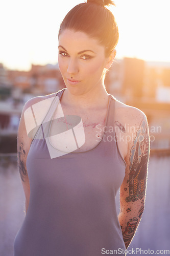 Image of Tattoo, portrait and fashion woman in city with urban body art or stylish aesthetic. Face, street or trendy female person from Canada in cool clothes, attitude or punk individuality outdoor at sunset