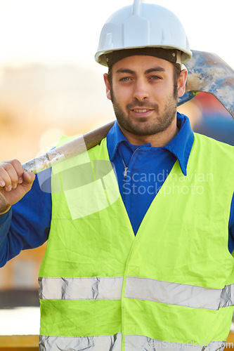 Image of Portrait, construction and man with a shovel, industry and architecture with skills, renovation and vest. Face, male person or employee with tools, equipment or safety with labor, spade or protection
