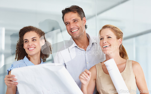 Image of Happy business people, blueprint and construction planning in meeting for collaboration at the office. Group or architect team smiling with document, paperwork or floor plan for architecture project