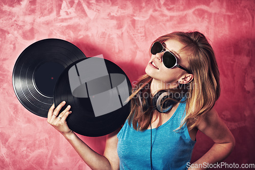 Image of DJ woman, mixer and sunglasses with vinyl records, vision and thinking for career at club, studio or party. Girl, music and party with ideas, headphones and mindset for event, celebration and job