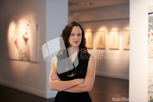 Image of Expert, arms crossed and portrait of a woman at an art gallery for an exhibition. Creative, culture and a museum manager with management of paintings, collection and curator of pictures at a studio