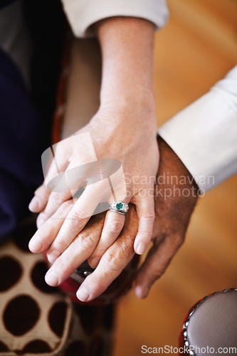 Image of Closeup, holding hands and senior couple with love, empathy and comfort with support, solidarity and help. Zoom, hand and old woman and elderly man with care, bonding and grief with loss and trust