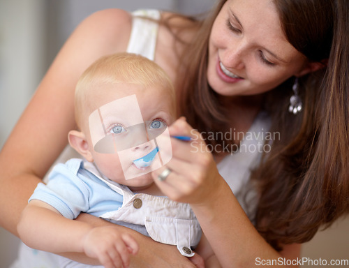 Image of Baby, mother and feed food, breakfast and eating for healthy nutrition. Happy mom, newborn and feeding hungry child, infant or toddler meal with a spoon for growth, development and morning wellness.