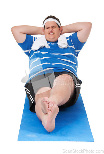 Image of Fitness, overweight and man doing a exercise in a studio for weight loss, health or wellness. Sports, obesity and fat male person doing a sit up body workout on yoga mat by isolated white background.