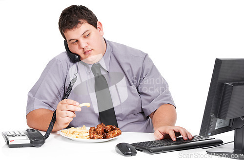 Image of Phone call, eating and plus size business man in studio on computer with food, lunch and unhealthy meal at desk. White background, office mockup and male worker with weight problem for for sales job