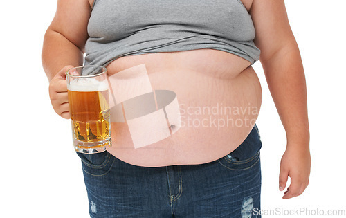 Image of Beer, weight gain drink and plus size stomach in a studio with alcohol problem with gut health issue. Heavy, overweight and drinking carbs with unhealthy body and alcoholic with high calories