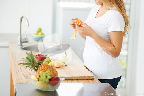 Image of Woman hands, orange peel and fruit for health food and nutrition for weight loss diet and health at home. Kitchen, fruits and plus size person in a house with breakfast and nutritionist in morning