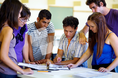 Image of Education, university and a teacher with his students in the class for lecture or group study hall session. Learning, scholarship and friends in college with a male professor for exam preparation