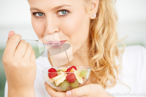 Image of Fruits, bowl and portrait of eating woman with healthy lunch or breakfast meal or diet in the morning at home. Nutrition, health and vegan person smile and happy for salad, food and self care