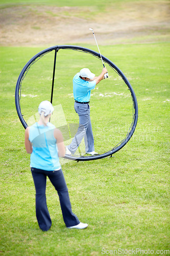 Image of Ring, woman or beginner golfer in golf course lesson for fitness, workout or exercise with a swing on field. Coaching, golfing game or athlete training with instructor for driving with a club stroke