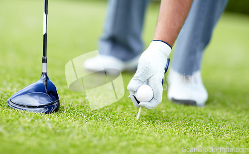 Image of Golf, closeup of man with sports club and ball on the grass course outside. Training or practice, sports with equipment and hand of a male athlete golfer outside for competition or tournament