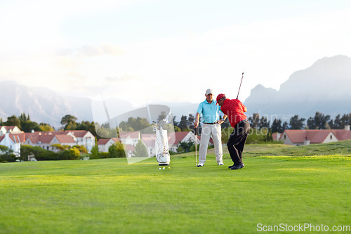 Image of Golf course, stroke and training on the course, field or men in professional, golfer sports club and exercise on the grass. Friends, businessman or healthy game or competition on the green turf