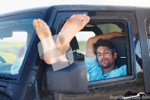 Image of Travel, tired and man in a car, sleeping and road trip on a break, getaway and resting with transport. Male person, traveler and guy in a vehicle, fatigue and driver with dream, vacation and holiday