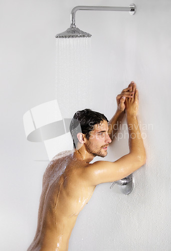 Image of Shower, man rest and bathroom with body cleaning and soap in the morning in home. Water, young male person and smile with hygiene and clean skin care in house with cosmetic grooming and shaving foam