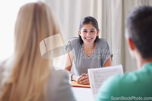 Image of Smile, meeting and a woman in a job interview with business people for recruitment or hiring. Happy, cv and a talking employee networking with hr for company internship and process of employment