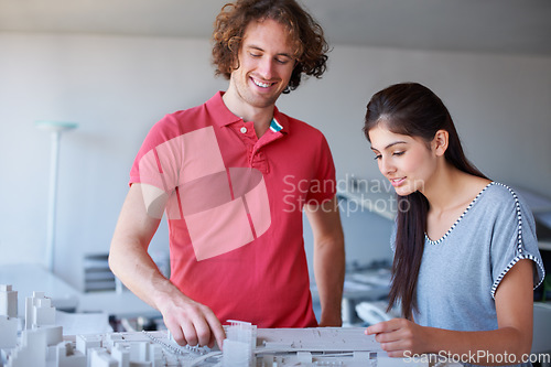 Image of Engineering, model and business people planning, teamwork and building development solution or happy ideas. Collaboration, architecture and woman with designer or partner talking of 3d infrastructure