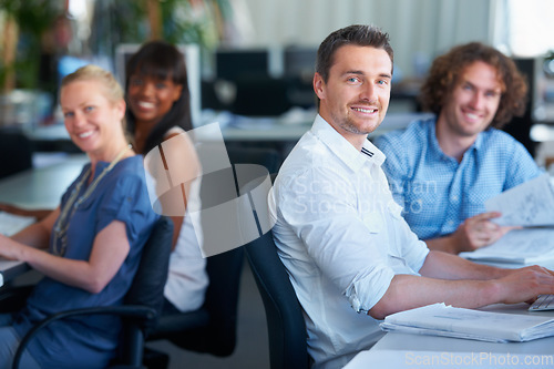 Image of Portrait, workspace and business people in teamwork, coworking and creative startup or agency in office. Happy, diversity and face or group of women, men or designer at desk and working together