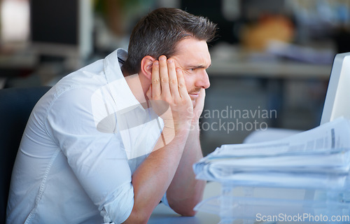 Image of Mental health, businessman with a headache and at his desk of a modern workplace office with fatigue. Stress or anxiety, mistake or problem and tired or frustrated male person at his workspace