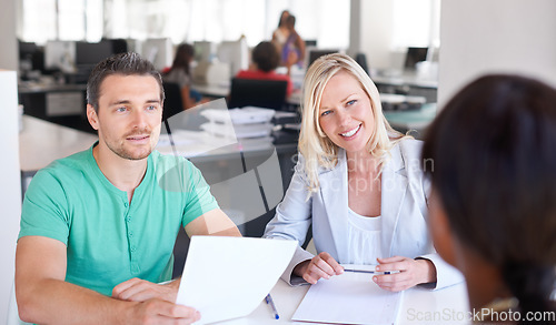 Image of Paperwork, interview and happy business people, meeting clients and hiring or recruitment in creative office. Documents, resume or cv with woman and partner in HR talking and questions for onboarding