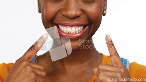 Image of Happy isolated African American female smiling for tooth, mouth or gum and oral hygiene. Black woman, teeth and smile for dental care, whitening or healthcare against a white studio background.