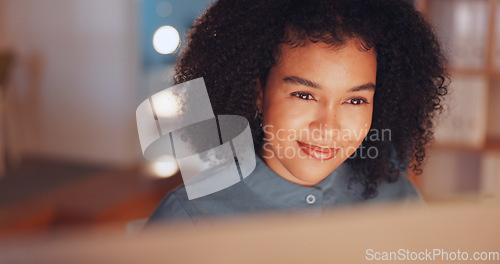 Image of Night, happy and computer with black woman in office for research proposal, project and satisfaction. Internet, technology and idea with employee in agency for information, confident and connection