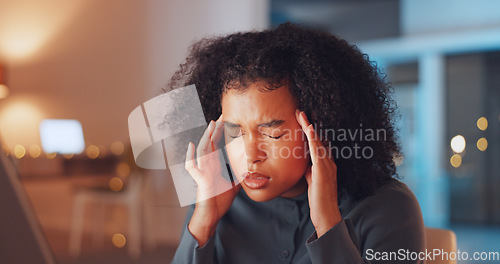 Image of Stress, migraine and businesswoman in the office at night working on a corporate project with a deadline. Frustration, headache and tired professional female employee with burnout in the workplace.