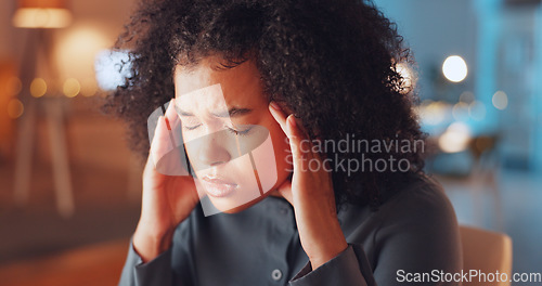 Image of Stress, headache and woman in the office at night working on a corporate project with a deadline. Frustration, migraine and tired professional female business employee with burnout in the workplace.