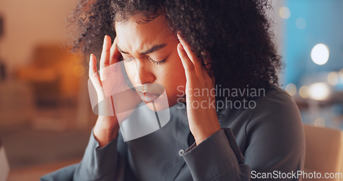 Image of Burnout, night and woman with a headache in the office while working on a deadline corporate project. Stress, migraine and tired professional female business employee with frustration in workplace.