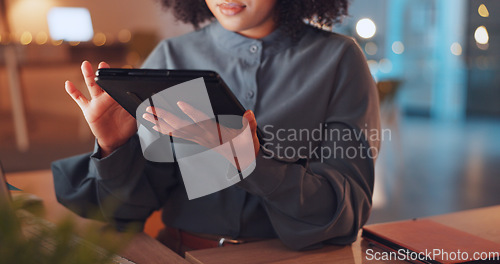 Image of Scrolling, tablet and hands of woman in office at night for research, overtime and analysis. Technology, internet and information with employee browsing online for connection, website and deadline