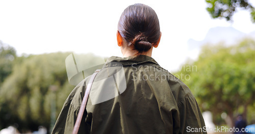 Image of Back, walking and business woman at park for travel, journey and trip to work outdoor in the morning. Pedestrian, walk and professional person travelling, entrepreneur commuting and stroll outside.